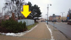 Tu stanie podświetlony napis "Malbork" w centrum miasta