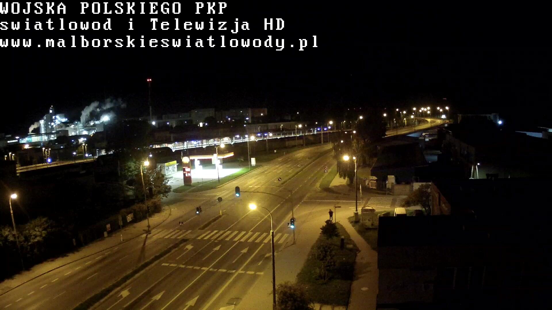 Podgląd: Malbork kamera Aleja Wojska Polskiego - ul. Chopina na żywo. Widok na perony stacji PKP i Cukrownie. Pociągi w Malborku live
